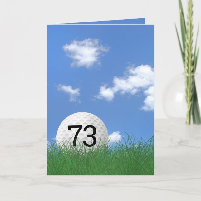 73rd birthday, golf ball in grass card (Front)