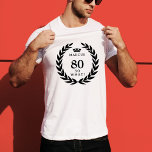80 So what Funny Laurel Wreath Crown 80th Birthday T-Shirt<br><div class="desc">80 So what Funny Laurel Wreath Crown 80th Birthday T-Shirt. A funny quote I`m 80 so what in modern bold fonts and black color. The design has a a laurel wreath around the words and a crown above the custom name. Add your name. Perfect gift for a man with a...</div>