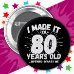 80 Year Old Sarcastic Meme Funny 80th Birthday Button<br><div class="desc">This funny 80th birthday design makes a great sarcastic humor joke or novelty gag gift for a 80 year old birthday theme or surprise 80th birthday party! Features 'I Made it to 80 Years Old... Nothing Scares Me' funny 80th birthday meme that will get lots of laughs from family, friends,...</div>