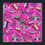 80s retro square wall clock<br><div class="desc">A colorful and retro 80's clock,  it is like stepping into a time machine and traveling to this cool era.  This clock features a lively pink design full of cassette tapes,  colorful instruments,  games and accessories from the 80's.  Purchase yours today!</div>