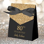 80th Birthday Black Gold Glitter Thank You Favor Boxes<br><div class="desc">This fabulous modern 80th Birthday Black Gold Glitter Thank You favor box with sparkling gold glitter, the birthday girl's name in a trendy script font, and tied with an elegant black bow would be perfect for your event. It would be great for a candy station, on a thank you gift...</div>