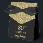 80th Birthday Black Gold Glitter Thank You Favor Boxes<br><div class="desc">This fabulous modern 80th Birthday Black Gold Glitter Thank You favor box with sparkling gold glitter, the birthday girl's name in a trendy script font, and tied with an elegant black bow would be perfect for your event. It would be great for a candy station, on a thank you gift...</div>