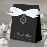 80th Birthday Black Vintage Crest Thank You Script Favor Boxes<br><div class="desc">This black birthday favor box has, on the flap, a vintage faux silver foil crest with the age in it, in gray. The message Thank You is written in the lower part, in an elegant gray script, the occasion and the date are written in gray caps under it. The background...</div>