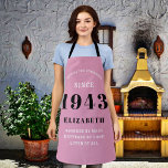 80th Birthday Born 1943 Pink Black Lady's Apron<br><div class="desc">A personalized classic pink apron design for that birthday celebration for somebody born in 1943 and turning 80. Add the name to this vintage retro style pink, white and black design for a custom 80 birthday gift. Easily edit the name and year with the template provided. A wonderful custom birthday...</div>