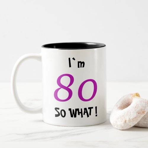 80th Birthday Funny Gift for Her Two-Tone Coffee Mug - A great gift idea for someone, especially for her (because of the colour scheme black - pink) celebrating 80th birthday. It comes with a funny quote I`m 80 so what!, and is perfect for a person with a sense of humor.