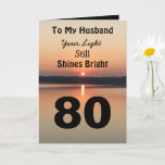 80th Birthday Husband Still Shines Bright Card<br><div class="desc">Give a happy 80th birthday card to your husband to express your “You Still Shine Bright” sentiment. A bold design with a black and gold sunrise on a peaceful lake sends a message of encouragement and love. Turn over the card to read the endearing birthday verse for an inspiring eightieth...</div>