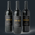80th Birthday Name 1945 Black Gold Elegant Chic Wine Label<br><div class="desc">1945 Vintage 80th Birthday Black & Gold Elegant Wine Label. Celebrate your milestone with our exclusive birthday wine label. The meticulously designed label with stunning black and gold hues effortlessly enhances the visual appeal of your favorite wine. The year prominently featured on the label, adds a nostalgic throwback to the...</div>