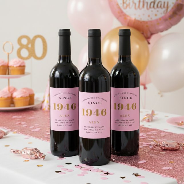 80th Birthday Name 1946 Pink Gold Elegant Chic Wine Label (1946 Pink wine bottle labels on a party table.)