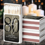 80th Birthday Party Matchboxes<br><div class="desc">80th Birthday Matchbox Favor. Celebrate eighty years in style with this bold, modern matchbox design. A large black “80” sits at the top, layered with a handwritten white “Eighty” for a sleek and eye-catching look. The background features a rich faux gold finish, adding a warm, elegant touch that feels celebratory...</div>