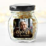 80th Birthday Party Photo Cheers Square Sticker<br><div class="desc">This custom 80th birthday sticker features the guest of honor's personalized photo and birthday,  along with the word "Cheers" in elegant gold-colored calligraphy script. A dark screen helps make the text pop. A great way to celebrate someone who's turning eighty!</div>