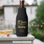 80th Birthday Retro Years in the Making Name Bottle Cooler<br><div class="desc">Retro 80th birthday personalized bottle coolers featuring a retro gold calligraphy script typography title 80 YEARS IN THE MAKING which incorporates his or her birth year within the design and your custom text in your choice of background color (shown in black). ASSISTANCE: For help with design modification or personalization, transferring...</div>