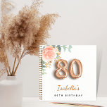 80th birthday rose gold eucalyptus guest book<br><div class="desc">For an elegant and feminine 80th birthday party. A chic white background. Decorated with a rose gold and blush pink watercolored rose flower, floral, green eucalyptus leaves, sprigs, greenery and faux gold sprigs. Personalize and a name. Black and golden letters. The name is written with a modern hand lettered style...</div>