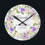 80th Birthday Rustic Purple Floral Round Clock<br><div class="desc">A gift or keepsake for a 80th birthday. Purple roses are nestled in green leaves. The name is written in beautiful calligraphy with 80th birthday and date below.</div>