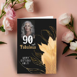 90 and Fabulous Gold Foliage 90th Birthday Photo Card<br><div class="desc">Elegant 90 and Fabulous Foliage 90th Birthday Photo Card. 90 and fabulous text in trendy white script with a name and golden foliage on a black background. Personalize it with your photo,  your name and the age. Add your text inside the card or erase it.</div>