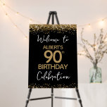90th Birthday Gold Glitter and Black Welcome Foam Foam Board<br><div class="desc">Elegant Faux gold glitter with shimmering confetti highlights on the top and bottom border. All text is adjustable and easy to change for your own party needs. Great elegant 90th birthday template design.</div>