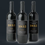 90th Birthday Name 1935 Black Gold Elegant Chic Wine Label<br><div class="desc">1935 Vintage 90th Birthday Black & Gold Elegant Wine Label. Celebrate your milestone with our exclusive birthday wine label. The meticulously designed label with stunning black and gold hues effortlessly enhances the visual appeal of your favorite wine. The year prominently featured on the label, adds a nostalgic throwback to the...</div>