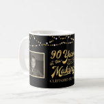 90th Birthday YEARS IN THE MAKING String Lights Coffee Mug<br><div class="desc">Honor and celebrate the 90-year-old with this black and gold mug featuring two photos (perhaps THEN and NOW pictures) of him or her. The design features retro typography stating 90 YEARS IN THE MAKING personalized with their birth year as part of the design and their name. PHOTO TIP: Choose a...</div>