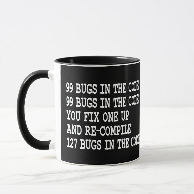 99 BUGS IN THE CODE YOU FIX ONE UP AND RE-COMPILE  MUG (Left)