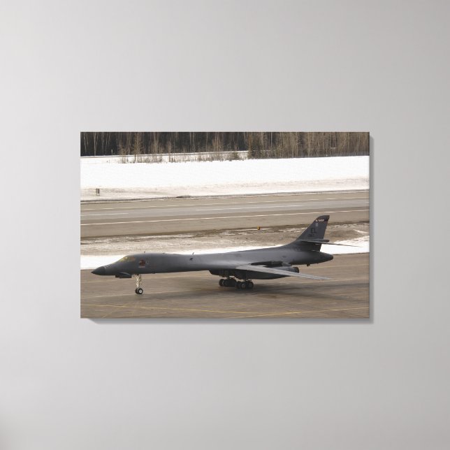 A B-1B Lancer performs a touch and go Canvas Print (Front)