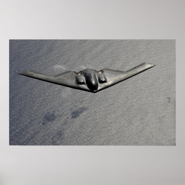 A B-2 Spirit flies over the Pacific Ocean Poster (Front)