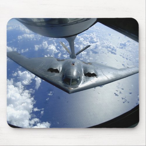 A B_2 Spirit moves into position for refueling Mouse Pad