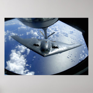 A B-2 Spirit moves into position for refueling Poster