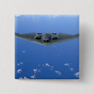 A B-2 Spirit soars through the sky Pinback Button