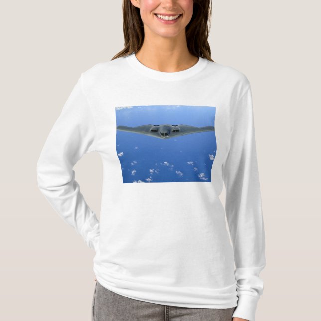 A B-2 Spirit soars through the sky T-Shirt (Front)