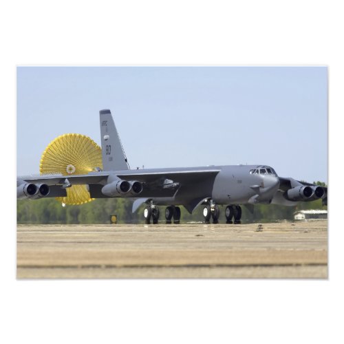 A B_52 Stratofortress deploys its drag chute Photo Print