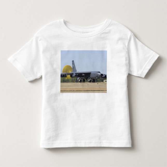 A B-52 Stratofortress deploys its drag chute Toddler T-shirt (Front)
