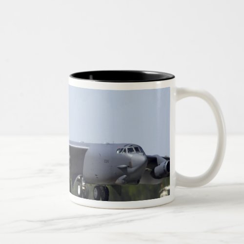 A B_52 Stratofortress deploys its drag chute Two_Tone Coffee Mug