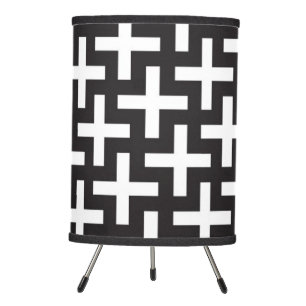 A b&w patterns made with 'plus' sign tripod lamp