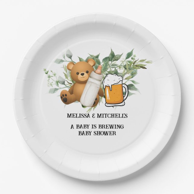 A baby is brewing baby shower paper plates (Front)