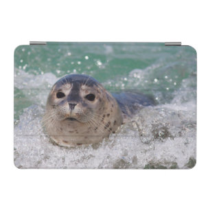 A baby seal surfing iPad mini cover
