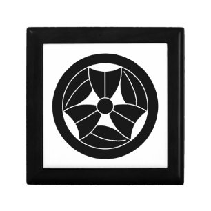 a bamboo leaf that is broken three times in a circ gift box