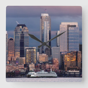 A beautiful and dramatic sunset seen from West Square Wall Clock