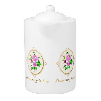  a beautiful tea pot with roses design