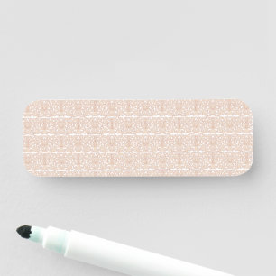 a beige and white checkered pattern on a white bac name tag