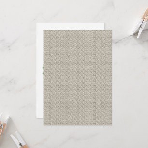 a beige background with a pattern of small squares invitation