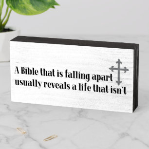 A Bible That is Falling Apart Wooden Sign
