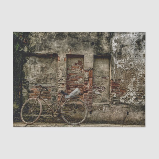 A Bicycle Resting on a Weathered Brick Wall Tissue Paper (Front)