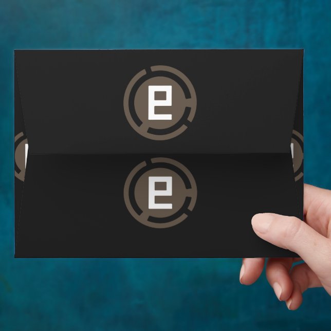 a black and brown logo with the letter 9 envelope (Hand)
