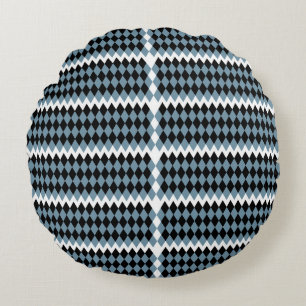 a black and white checkered pattern with a white b round pillow