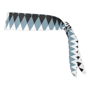 a black and white checkered pattern with a white b tie headband