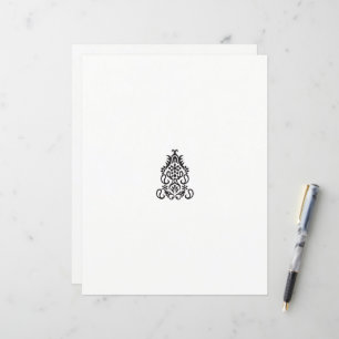 a black and white image of an ornate design