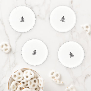 a black and white image of an ornate design coaster set