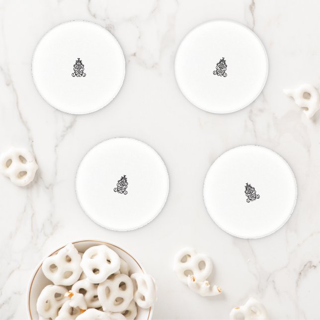 a black and white image of an ornate design coaster set (In Situ)