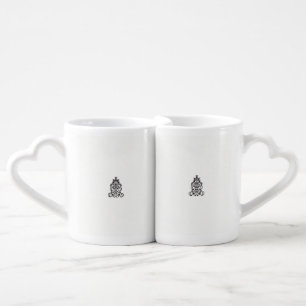 a black and white image of an ornate design coffee mug set