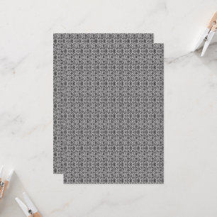a black and white paisley pattern invitation