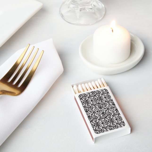 a black and white paisley pattern matchboxes (Insitu)